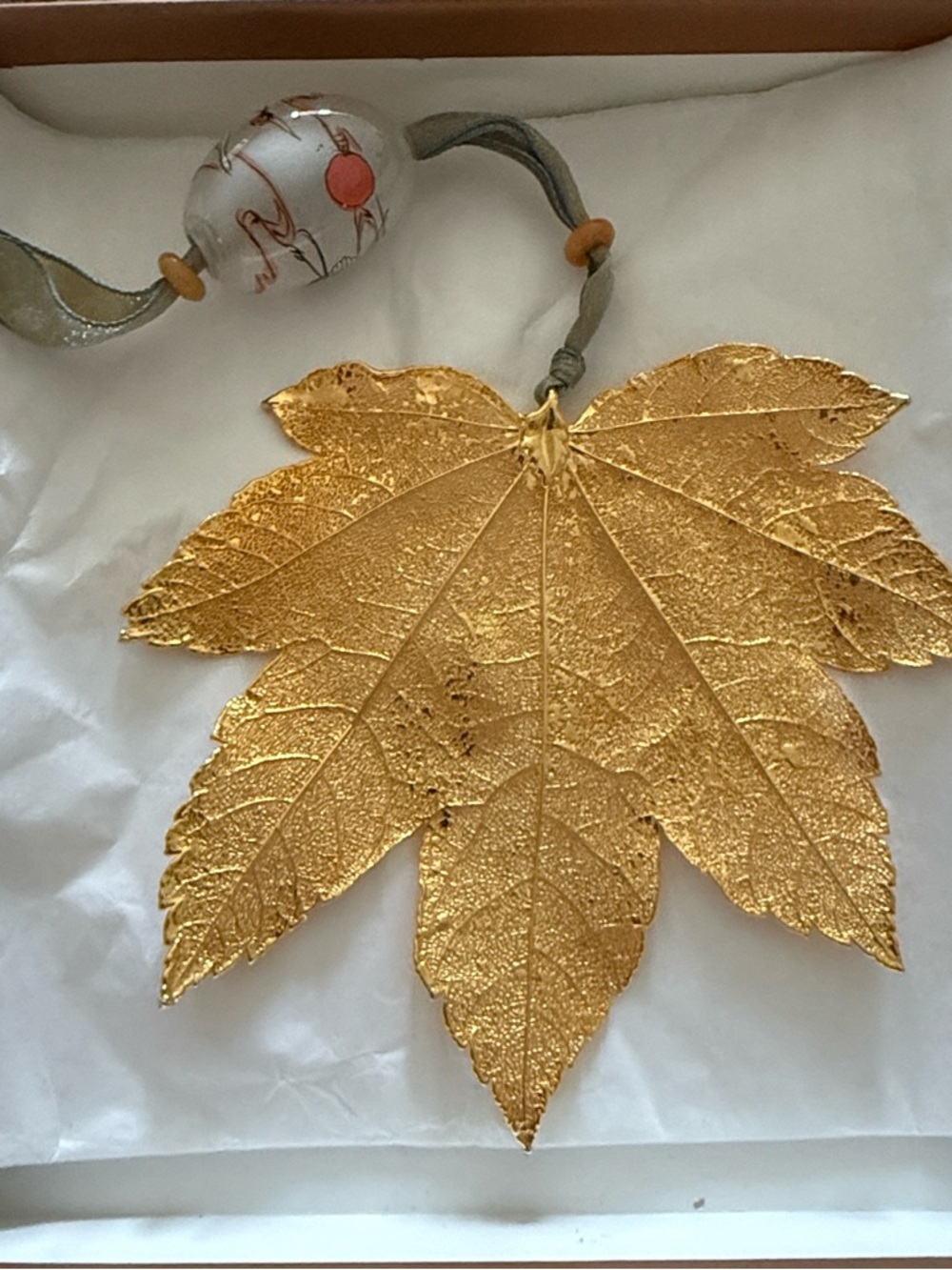 Gold Leaf Ornament with Crane Bead Accent by Still Life